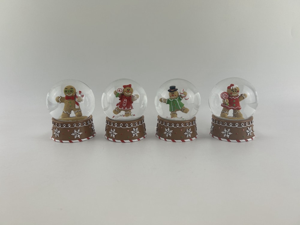 Globo de neve de vidro brilhante, o presente de Natal perfeito